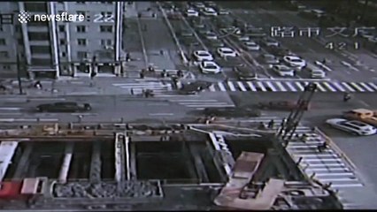 Road collapses causing sinkhole in China