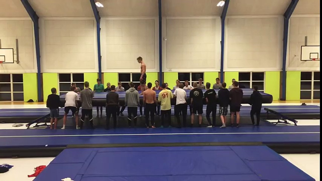 Huge quadruple backflip (with a little help from friends!)