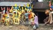 How Indian Potter Making Painting On Idol Of Goddess jagadhatri Roadside : wildindiafilms