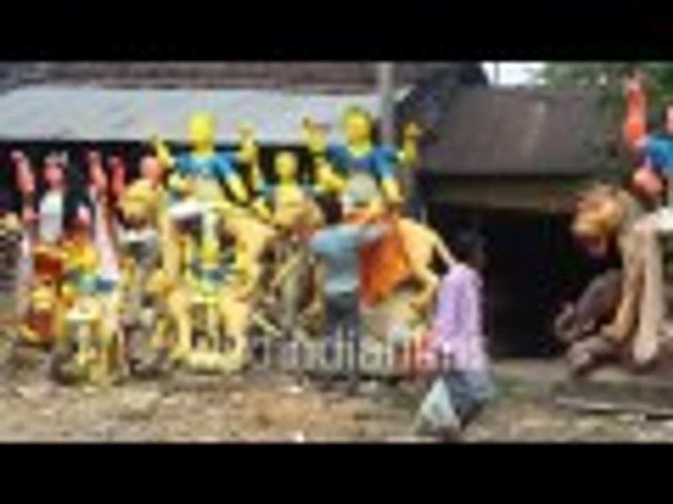 How Indian Potter Making Painting On Idol Of Goddess jagadhatri Roadside : wildindiafilms