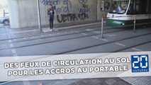 Des feux de circulation au sol pour les accros au portable