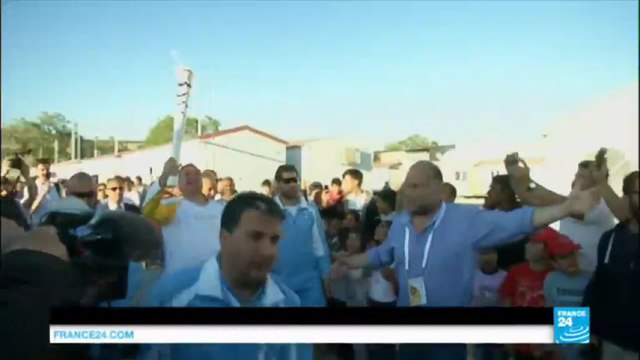 J-100 avant les Jeux Olympiques de Rio - La flamme olympique dans un camp de migrants en Grèce