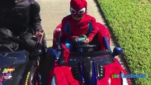 SUPERHEROES BATTLE POWER WHEELS RACE Ride On Car for kids Batman vs Spiderman Egg Surprise Toys