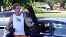 How to strap a SUP or surfboard to a car without roof racks