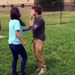 Angry girl punch the boy on face