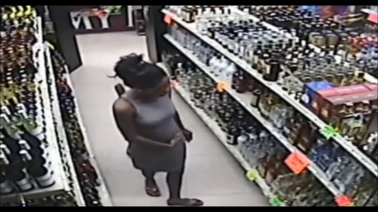 Woman Caught On Camera Teaching Child To Steal Liquor (Video)