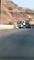Brave car driver controls and stops 22 wheeler trailer with failed brakes on motorway in pakistan