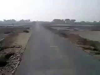 Dangerous Motorbike Ride By a Kid in Pakistan