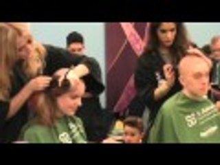 Girl headshave at St baldrick's 2016