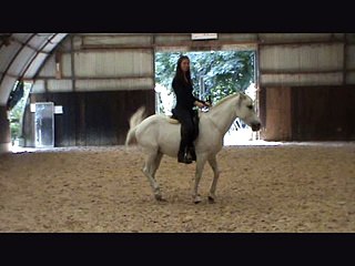 Girl ride Horse without any support