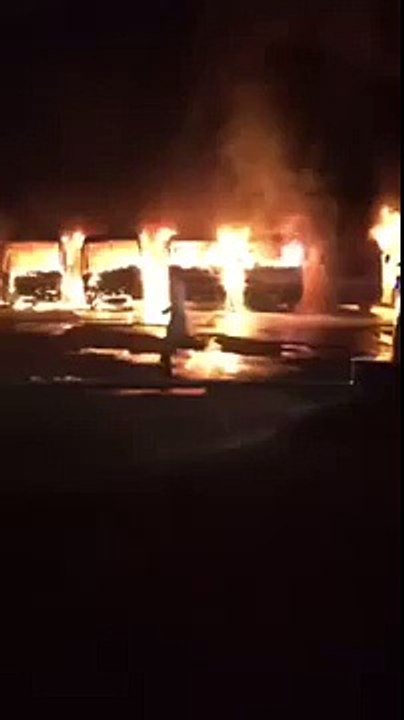 Sacked workers in Saudi Arabia set fire to buses in protest over unpaid salaries