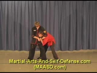 Martial-Arts-And-Self-Defense.com Headlock Defense