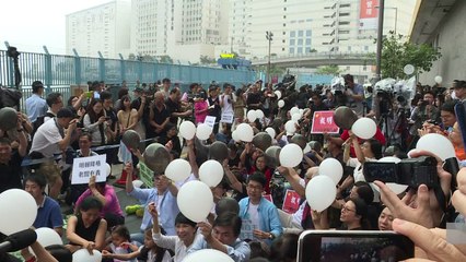 Hundreds protest over sacking of Hong Kong editor