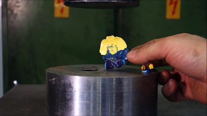 Crushing legos with hydraulic press