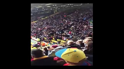 Aston Villa fans celebrating winning a corner at Watford