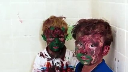 Dad cant stop laughing at kids covered in paint