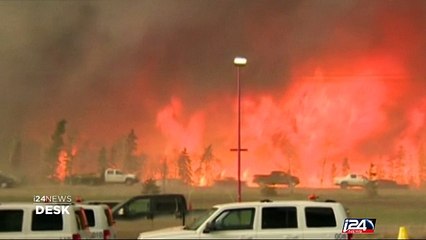Wild fire in Canada forces thousands to flee