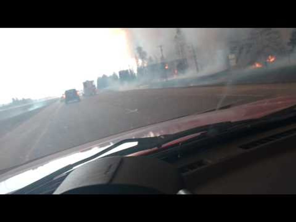 Fort McMurray Wildfire Edges Close to Road as Residents Flee