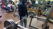 Shoulder shrug 315 pounds for 15 reps with straps