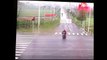 Video: Cyclist narrowly escapes collision with tractor trailer in China