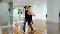 Model Rachael Finch twirls in a crop top with dancer husband