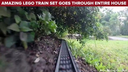 Amazing lego train set goes through entire house