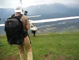 Man flies as air plane in the sky using a jet body