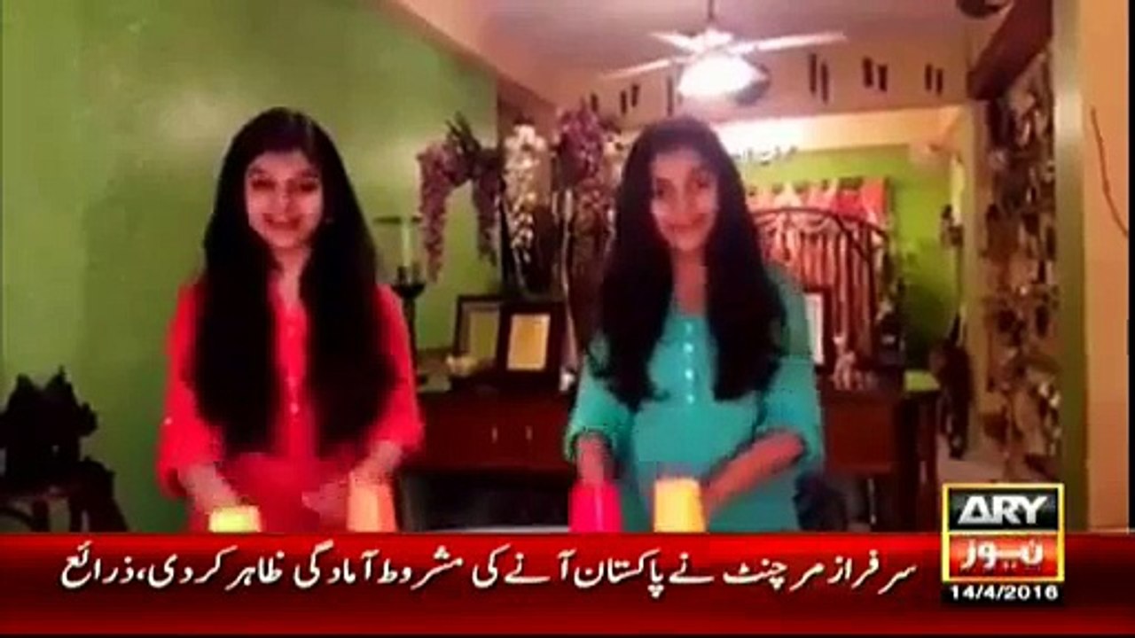 Two Girls sing song with table and plastic cup Music