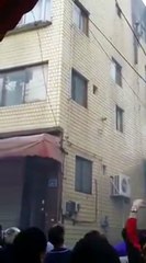Heroic airmen SAVE Mother & 3 children fall from 4th floor of burning building in incredible escape
