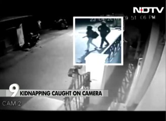Bengaluru woman picked up and taken away - Footage