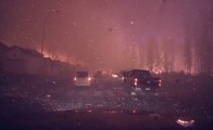 Close view of what it's like to drive through massive wildfire
