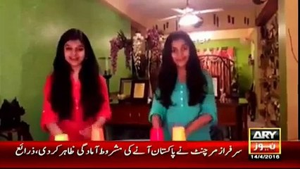 Two Girls sing song with table and plastic cup Music