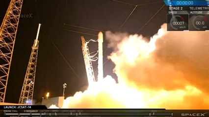 SpaceX rocket launches satellite then lands on ship at sea