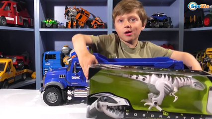 BRUDER MACK Грузовик. Сюрприз для Игорька — Динозавр. Игрушки для детей. Dinosaur Roboraptor