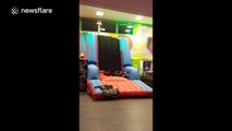 Man faceplants after failing to stick to velcro wall