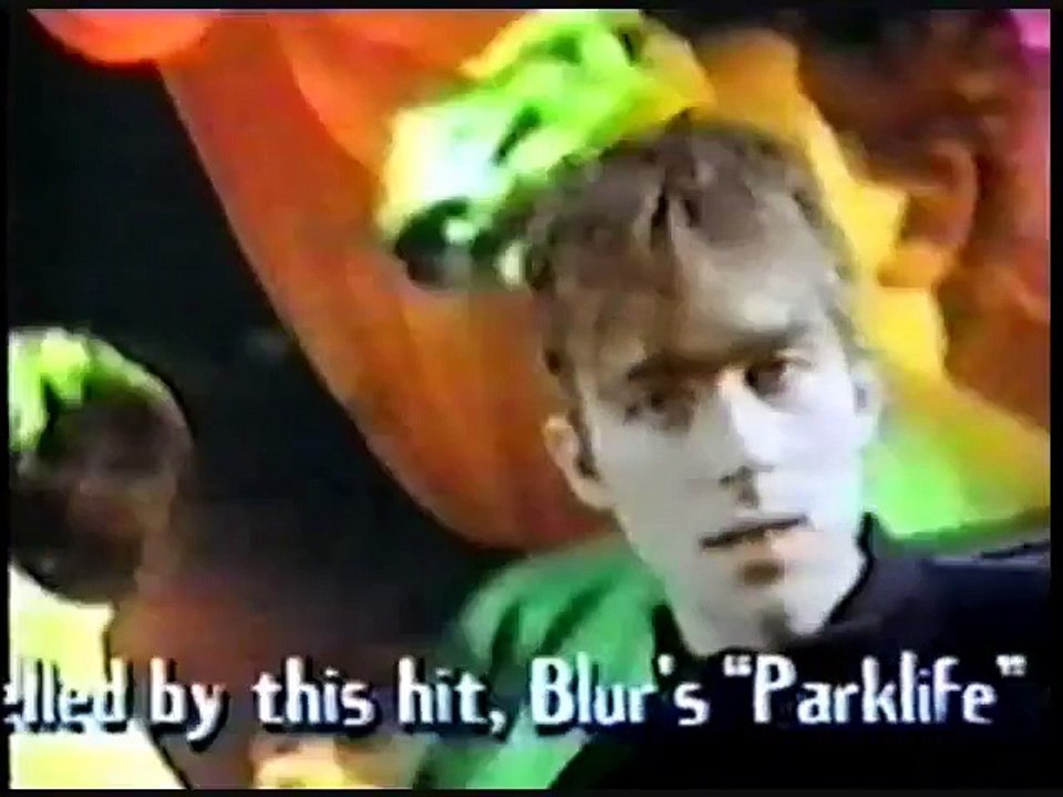 Damon Albarn and Alex James interviewed during a game of darts