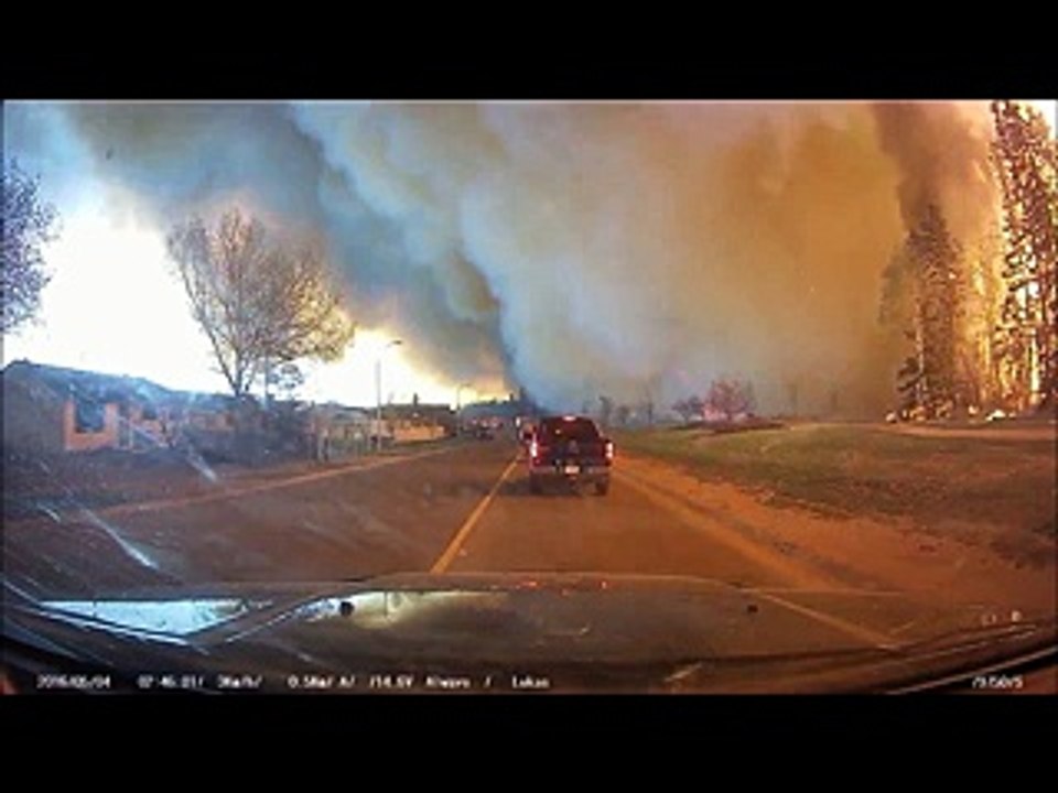 Fort McMurray Fire Fury - 9 minute Hell ride out a town