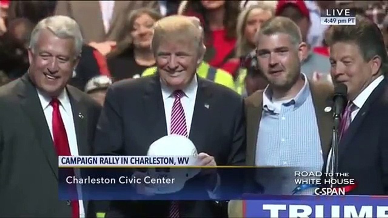 Trump dons a coal miner's helmet at West Virginia rally