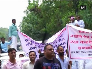 Taxi drivers protest outside CM Kejriwal’s residence