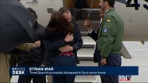 Syrian war : three Spanish journalists kidnapped in Syria return home