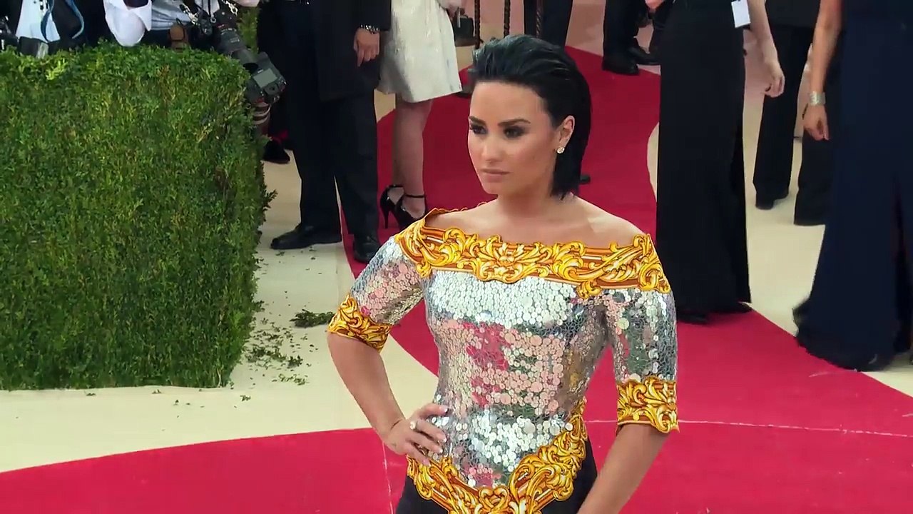 Demi Lovato & Nicki Minaj Shade Each Other After Awkward Met Gala Run In