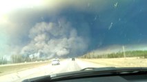 Huge plumes of smoke rising out of Fort McMurray, Canada