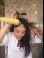 Asian Girl eating Corn with a drill fail