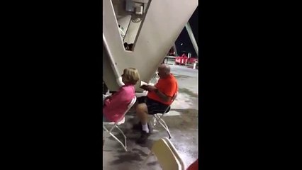 Man reads book at Beyonce concert  with his wife who totally ignored the show -