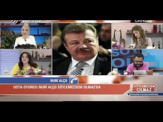 Nuri Alço'yu Gören Bir Kişi Korkup Bardağını Kapatmış