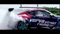 Aerobatic Helicopter Chases Drifting Race Car