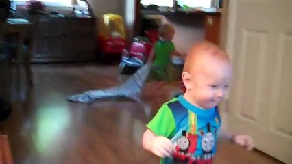 ---Twin boys playing with their Boston Terrier