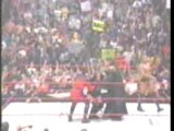 WWE - Undertaker and Kane BOTH chokeslam HHH through a table