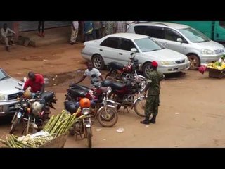 Police Disperse Crowds After Surprise Besigye Appearance in Kampala