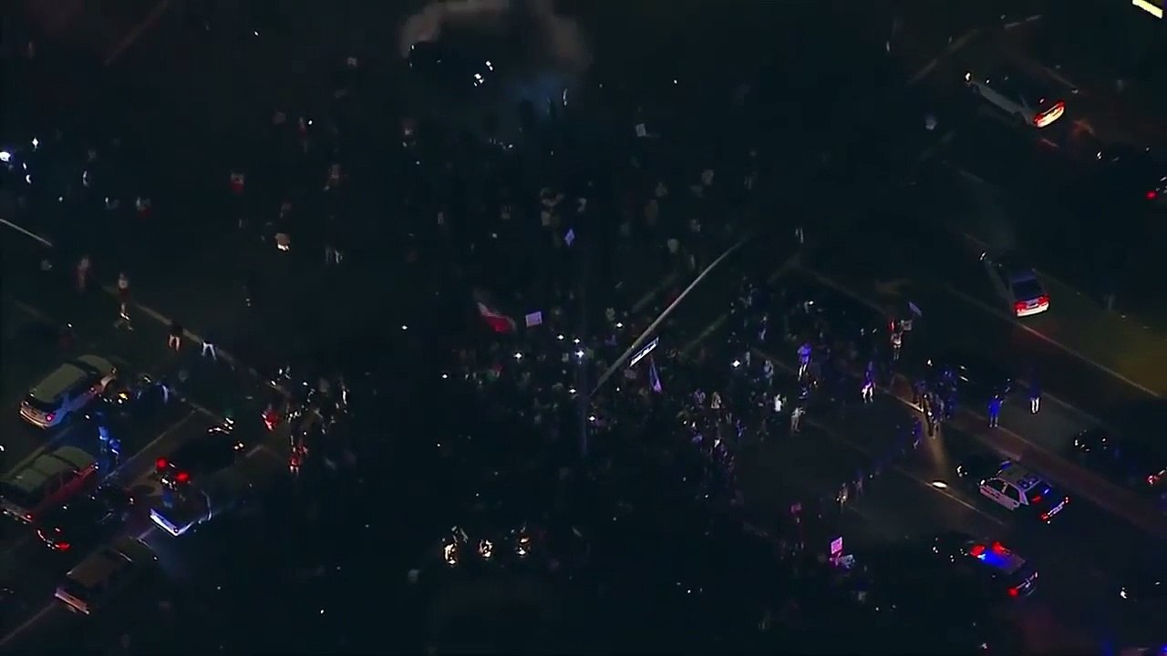 Trump Supporter Does Donuts Around Anti Trump Protesters In Orange County, California (FUL
